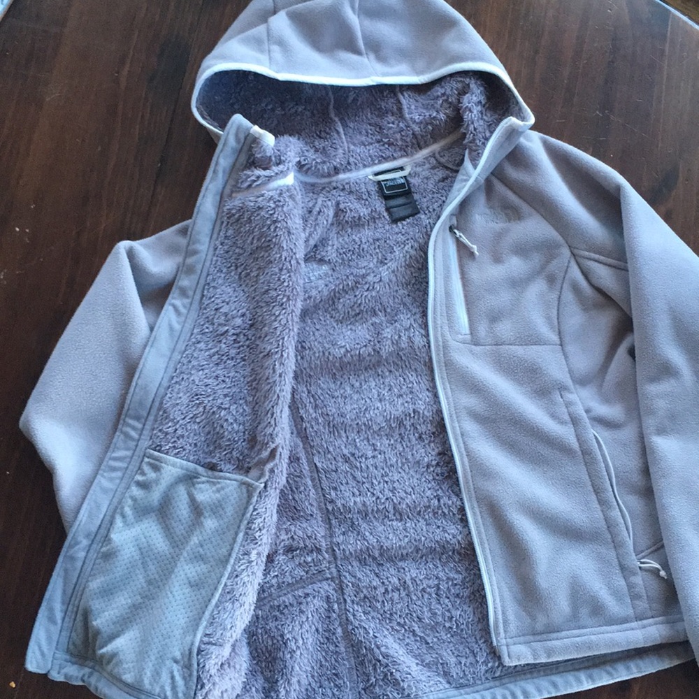 The North Face fleece zip up jacket with hood.